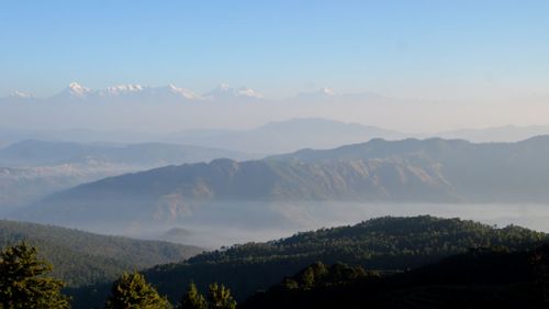 Scenic view of mountains against sky during sunset