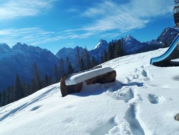 Scenic view of snow covered mountain against sky