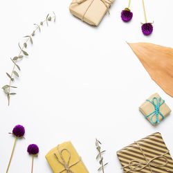 High angle view of books on table against white background