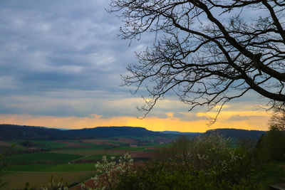 Scenic view of landscape against sky during sunset