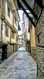 Narrow alley along buildings