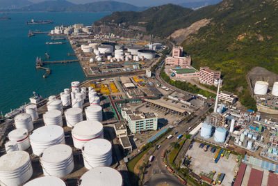 High angle view of harbor by buildings in city