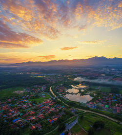 High angle view of townscape against sky during sunset