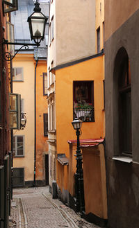 Street light on walkway in city