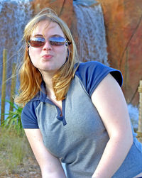 Portrait of woman wearing sunglasses