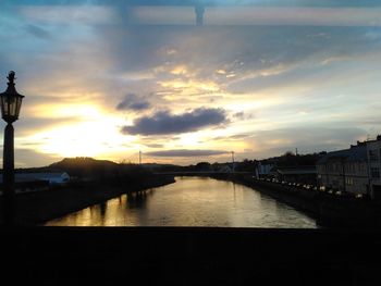 Scenic view of sunset over river