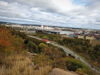 Aerial view of cityscape against sky