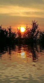 Scenic view of sunset over river