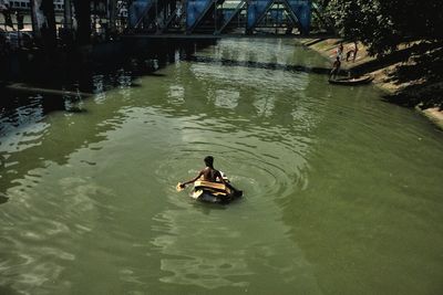 High angle view of man swimming in river