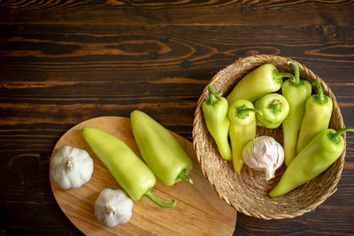 High angle view of fruits in basket on table