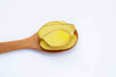 Close-up of bread against white background