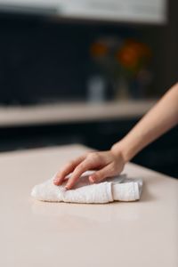 Cropped hand of person preparing food