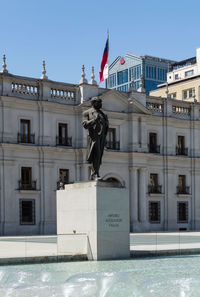 Statue of building against sky