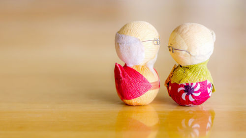 Close-up of multi colored eggs on table