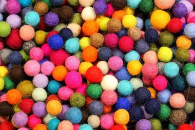 Full frame shot of colorful textile balls