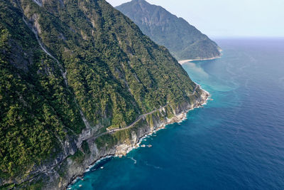 Aerial view of cliff by seascape