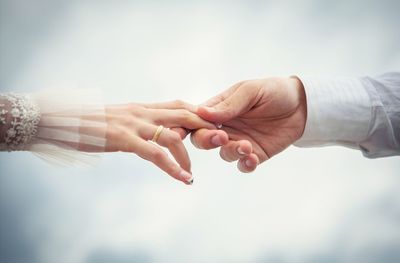 Cropped image of woman holding hands