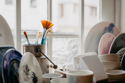 Close-up of coffee cup on table