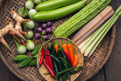 High angle view of vegetables in wicker basket on table