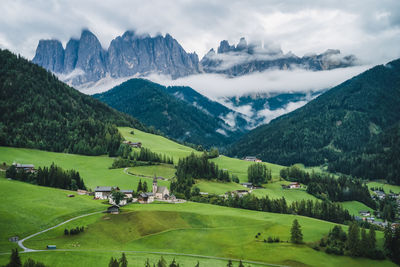 Scenic view of landscape and mountains against sky