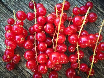 High angle view of red berries on table