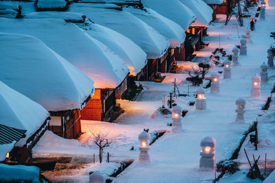 High angle view of people on snow covered road