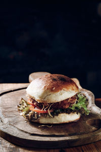 Close-up of burger in plate on table