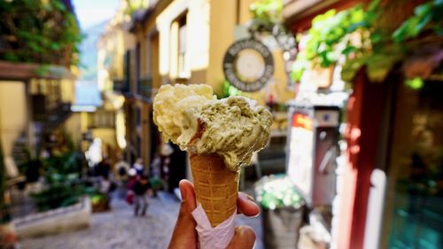 Person holding ice cream cone