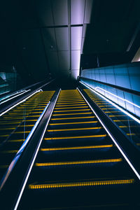 Low angle view of escalator in building