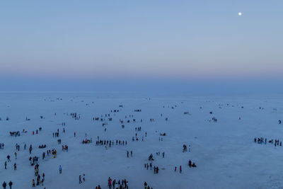 High angle view of people enjoying in sky