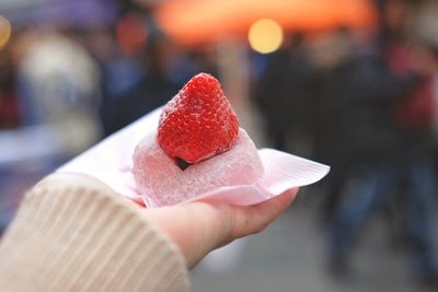 Close-up of woman holding ice cream