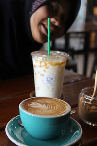 Close-up of coffee cup on table