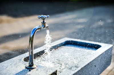 Close-up of water splashing from faucet