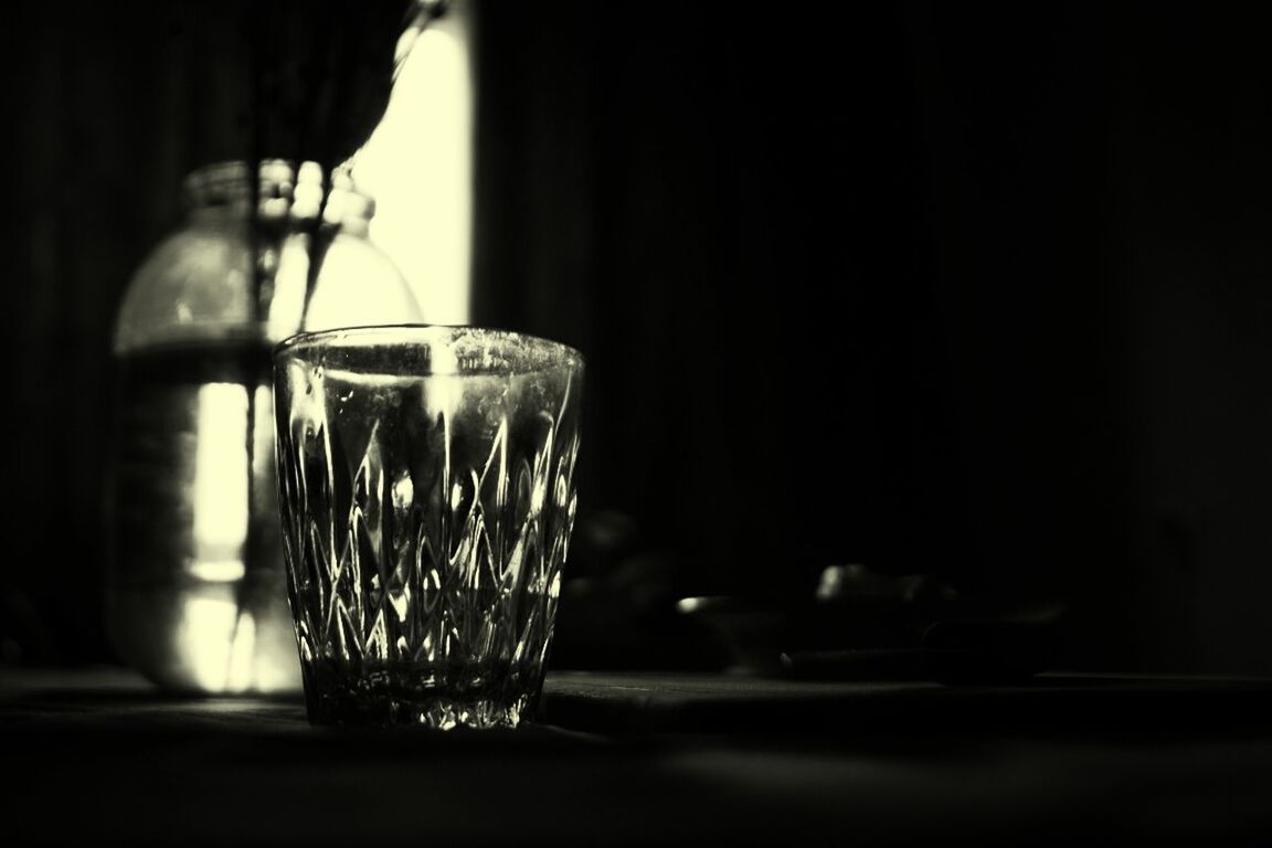 indoors, illuminated, lighting equipment, table, glass - material, close-up, still life, focus on foreground, home interior, candle, transparent, lit, dark, electric lamp, selective focus, light bulb, electricity, no people, vase, lamp