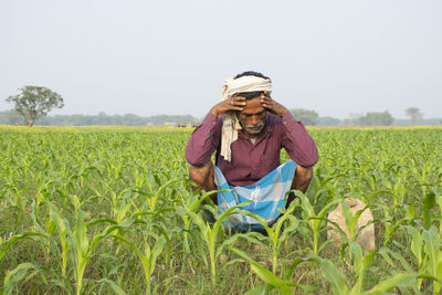 Full length of man standing on field