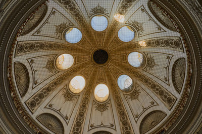 Low angle view of ornate ceiling of building