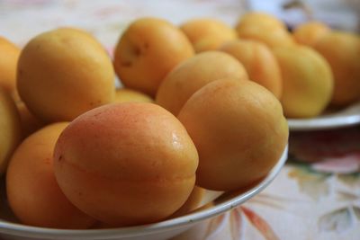 Close-up of oranges on table