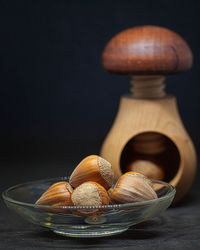 Close-up of eggs on table against black background