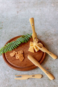 High angle view of bread on cutting board