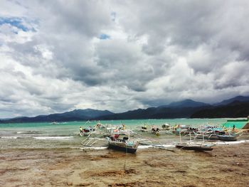 Scenic view of sea against cloudy sky