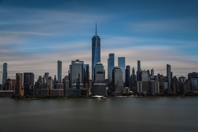 Modern buildings in city against sky