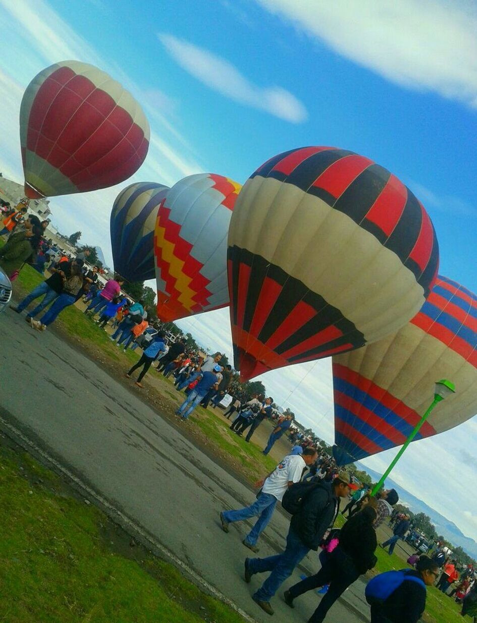 LOW ANGLE VIEW OF HOT AIR BALLOON FLYING IN SKY