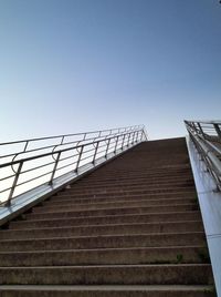 Low angle view of staircase against clear sky