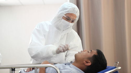 Patient getting tested by doctor
