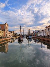 Boats moored at harbor