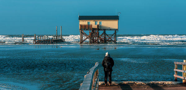 Pile dwelling on the beach of sankt peter-ording in germany.