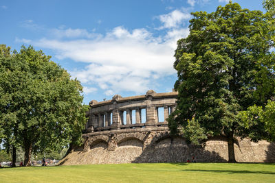 View of historical building against cloudy sky