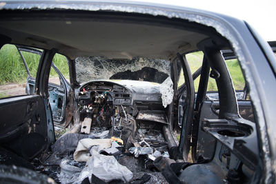 Abandoned cars in bus