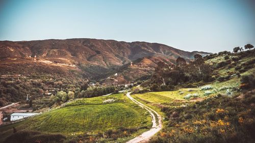 Scenic view of mountains against clear sky