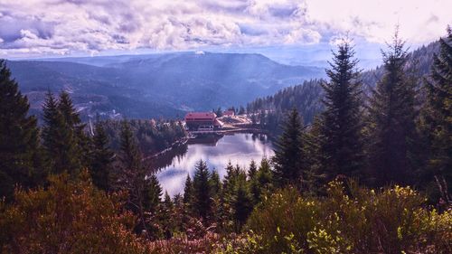 High angle view of trees and mountains against sky